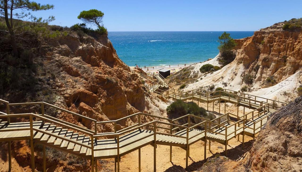 Epic Sana Algarve Hotel Albufeira Bagian luar foto The boardwalk at the beach