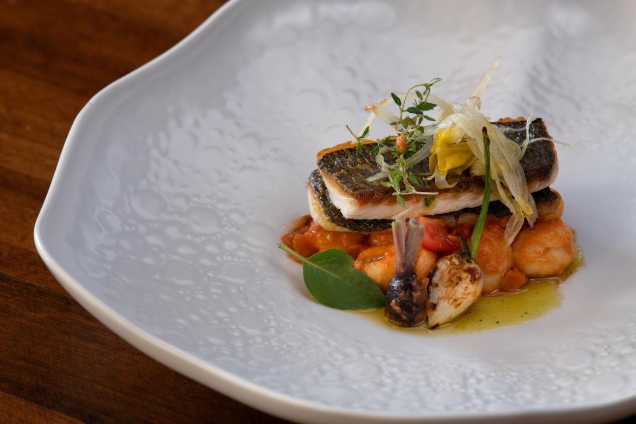 Epic Sana Algarve Hotel Albufeira Bagian luar foto A modern interpretation of a Spanish dish, prepared by the restaurant El Bulli