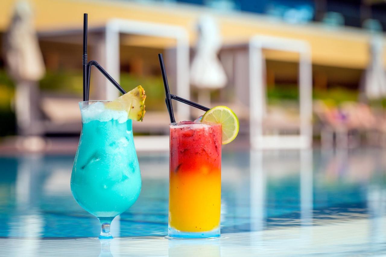 Epic Sana Algarve Hotel Albufeira Bagian luar foto Two cocktails
