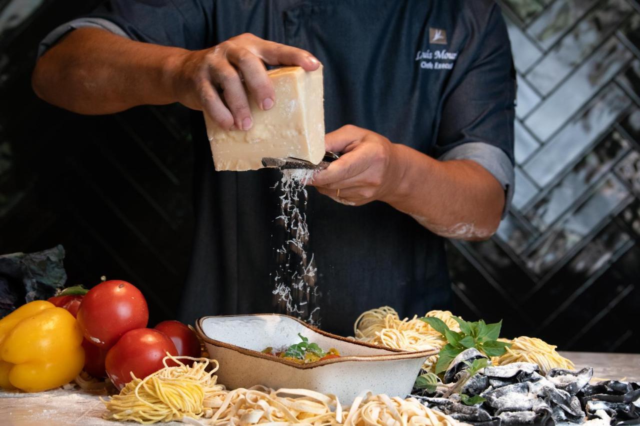 Epic Sana Algarve Hotel Albufeira Bagian luar foto Parmigiano-Reggiano being grated