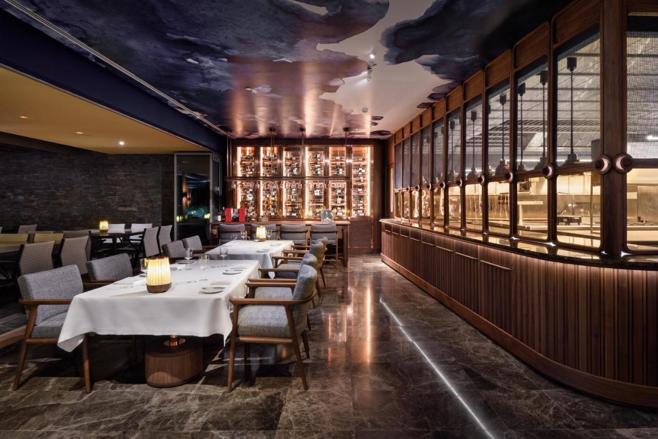 Epic Sana Algarve Hotel Albufeira Bagian luar foto The interior of the restaurant