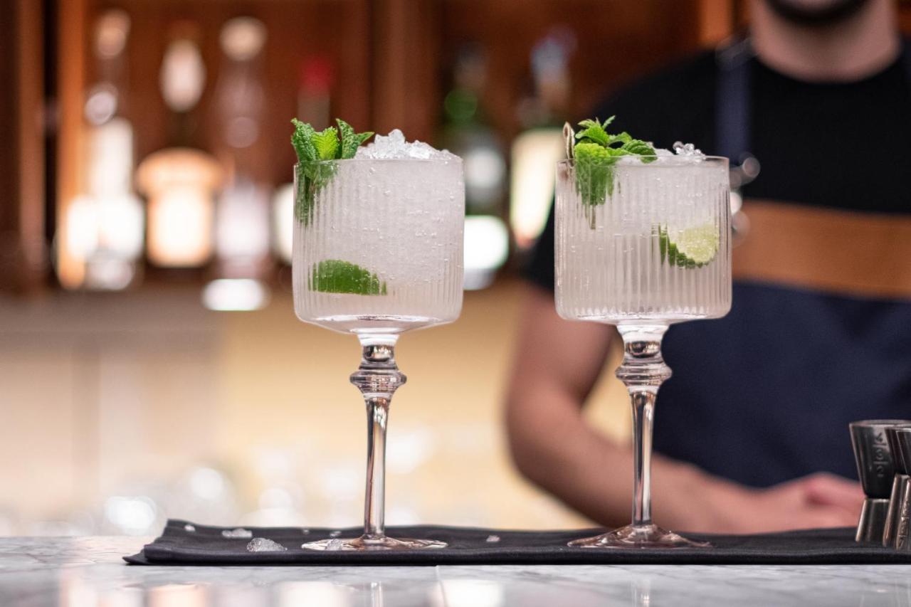 Epic Sana Algarve Hotel Albufeira Bagian luar foto Two G&T cocktails