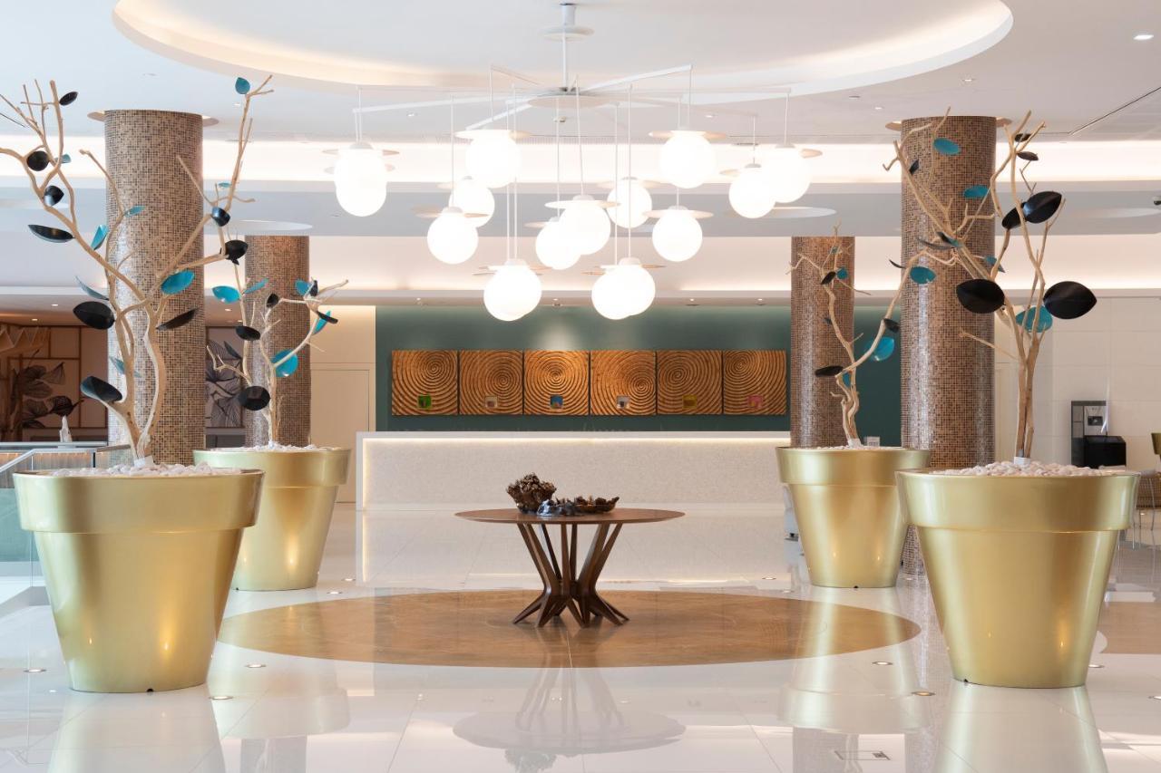 Epic Sana Algarve Hotel Albufeira Bagian luar foto The lobby of the hotel