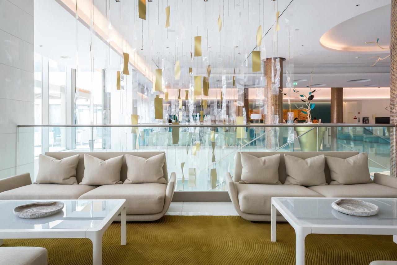 Epic Sana Algarve Hotel Albufeira Bagian luar foto The interior of the hotel